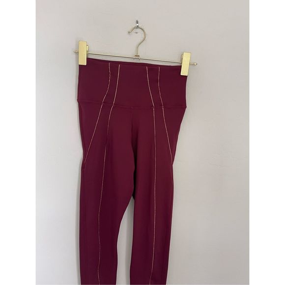NIKE Yoga Dri-FIT lurex tape 7/8 high-waisted leggings in burgundy Size Small - Picture 3 of 6